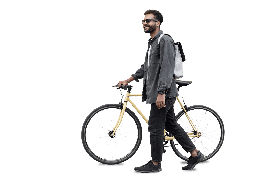 Cyclist walking bicycle
